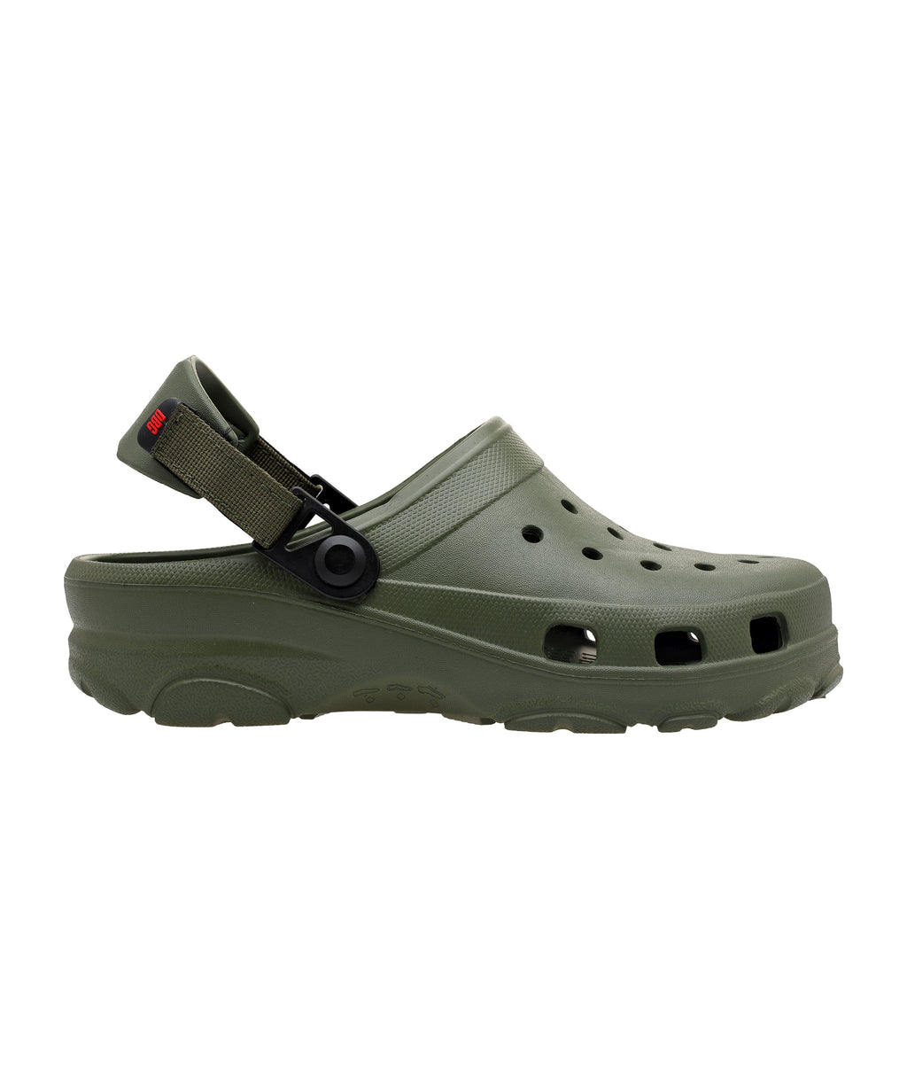 Green clog shoe with a strap on a white background